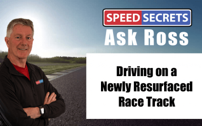 Q: What driving technique changes should I make when driving on a newly-resurfaced race track?